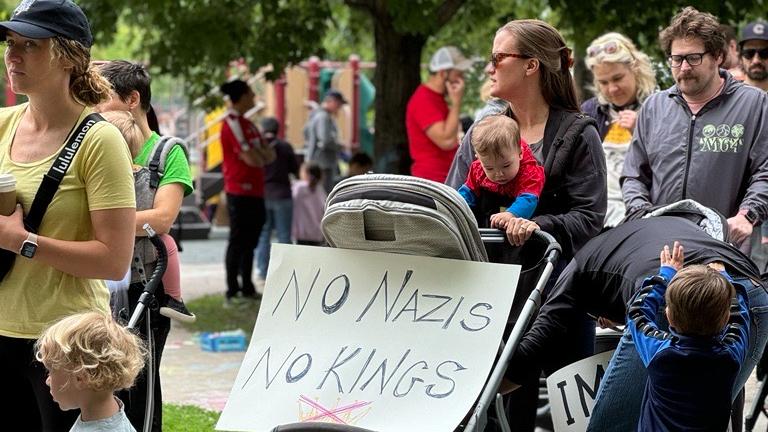 A morning family-friendly event in Chicago's Jefferson Park neighborhood kicked off rallies across the area on June 15, 2025. (Patty Wetli / WTTW News)