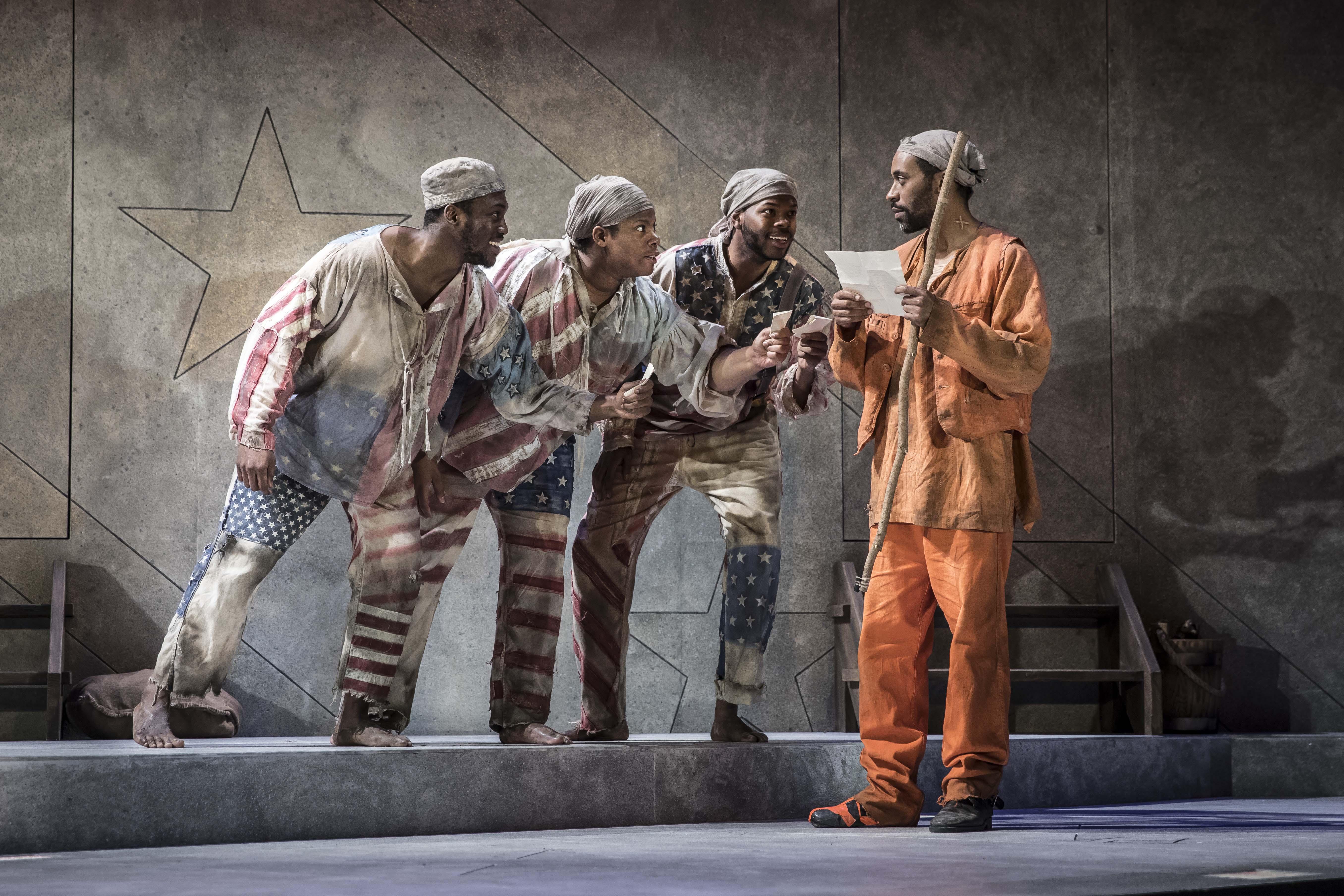 From left: Bernard Gilbert, Nicole Michelle Haskins, Tyrone Phillips and Jaime Lincoln Smith in the Chicago premiere of “Father Comes Home from the Wars (Parts 1, 2 & 3)” by Suzan-Lori Parks. (Credit: Liz Lauren)