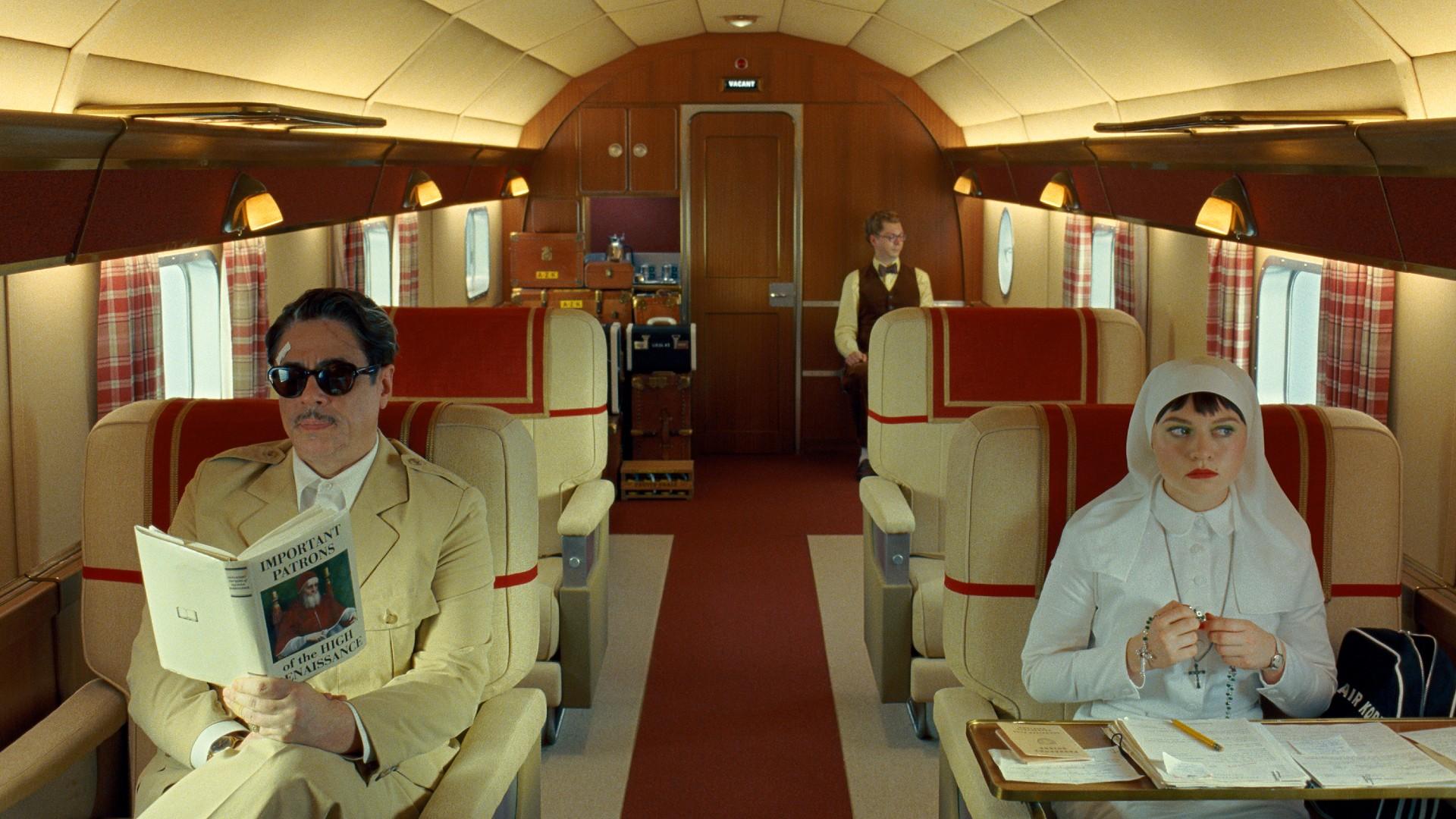 This image released by Focus Features shows, from left, Benicio Del Toro, Michael Cera and Mia Threapleton in a scene from &quot;The Phoenician Scheme.&quot; (TPS Productions / Focus Features via AP)