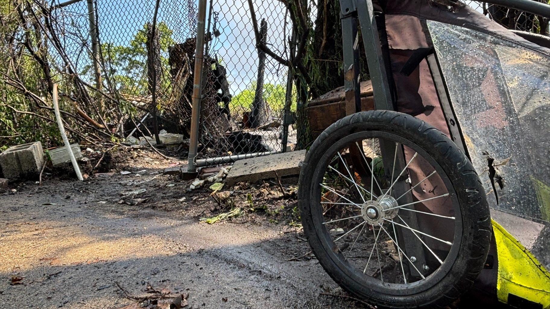 A fire broke out in a homeless encampment along the North Shore Channel on July 28, 2025. (Crystin Immel / WTTW News)