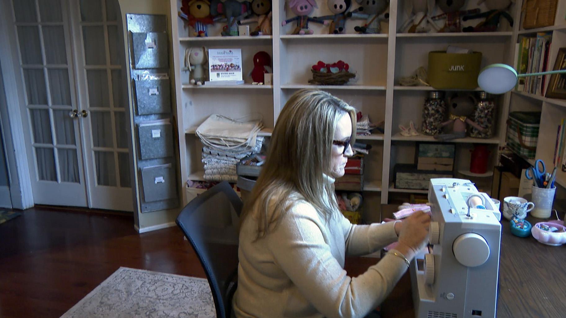 Jennifer Einerson, creator of Fly Little Bird, assembles a Stuffie in her Hyde Park home studio. (WTTW News)