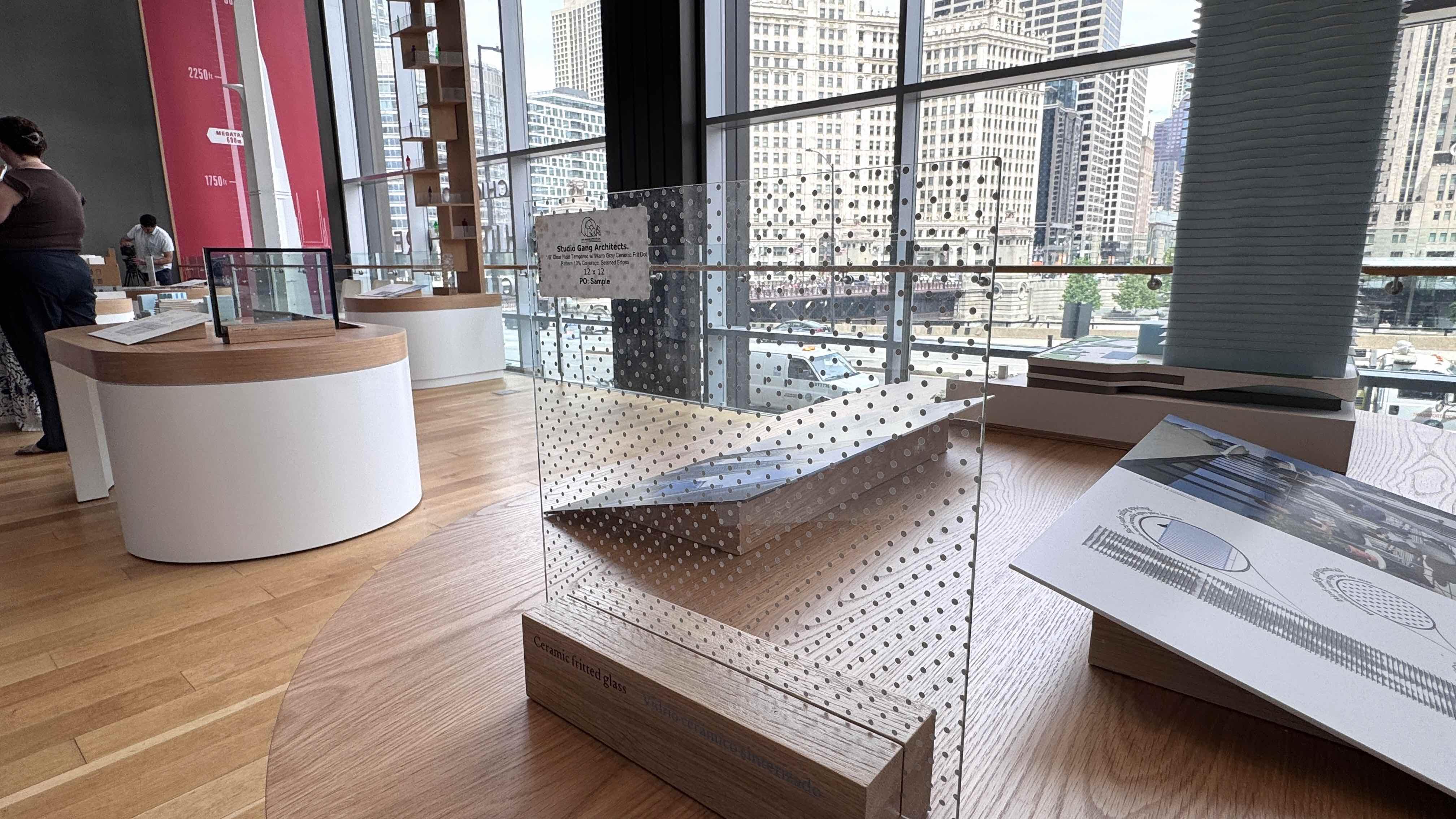 “Flyway City” includes models of some of the bird-friendly solutions developed by Jeanne Gang’s firm, Studio Gang. Here, bird-friendly glass used in the Aqua Tower is on display. (Patty Wetli / WTTW News)