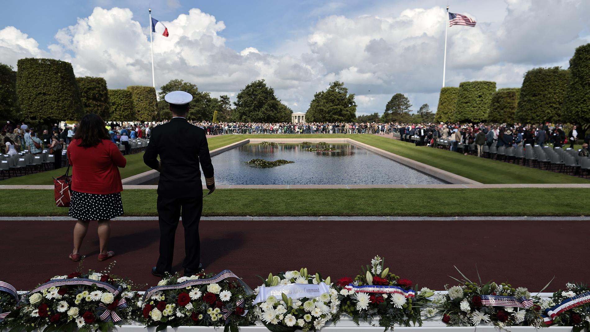 Wreath of flowers are displayed as French and international visitors attend the 78th anniversary of D-Day ceremony, in the Normandy American Cemetery and Memorial of Colleville-sur-Mer, overlooking Omaha Beach, Monday, June, 6, 2022. (AP Photo / Jeremias Gonzalez)