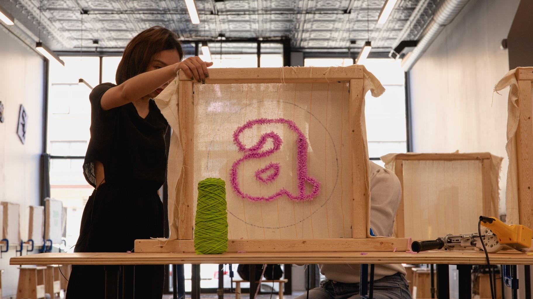 Freestyle Ceramics and Tufting in Bridgeport offers rug tufting classes. It takes about three hours to finish the smallest size rug. (Michael Izquierdo / WTTW News)