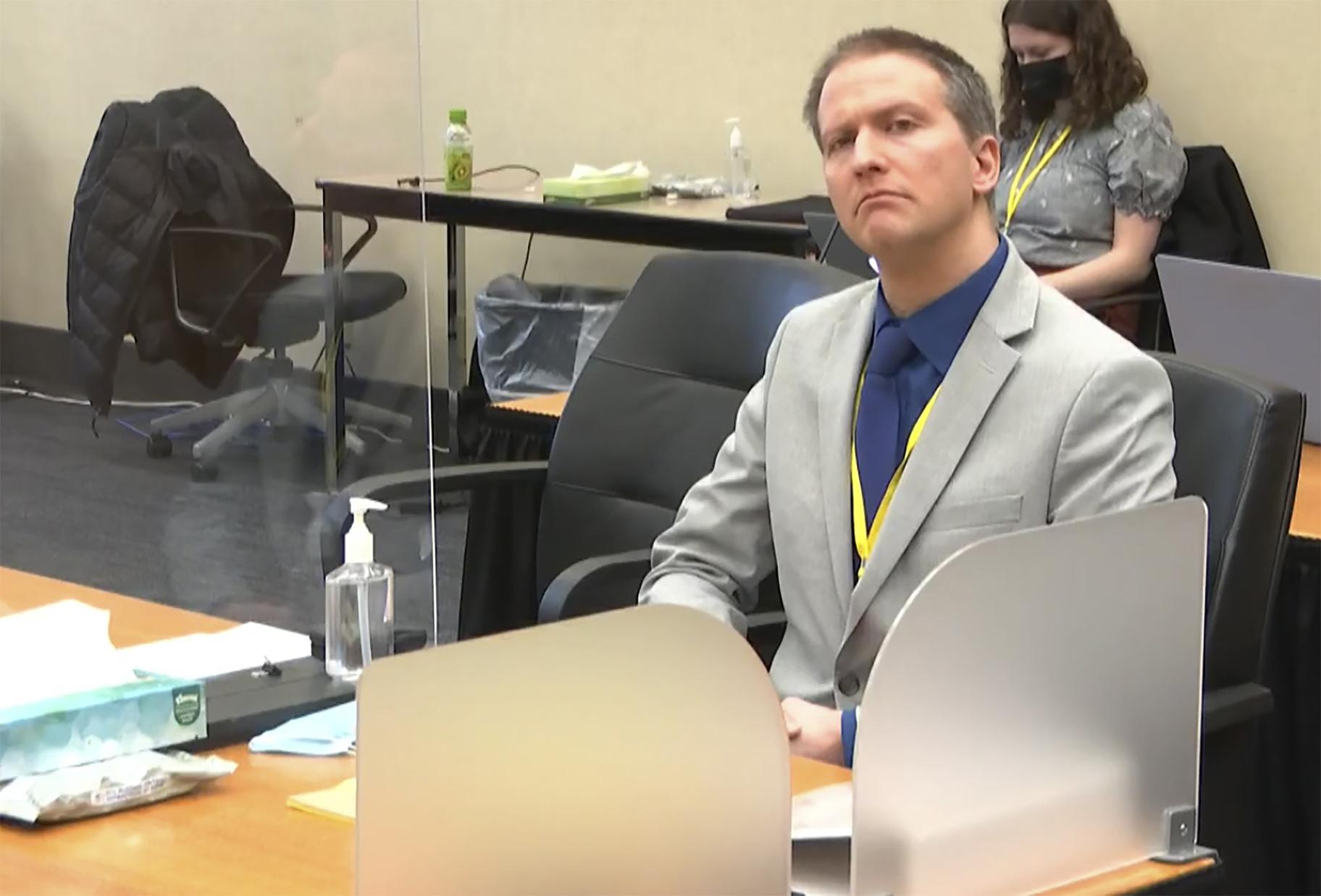 In this image from video, former Minneapolis police Officer Derek Chauvin listens as his defense attorney Eric Nelson gives closing arguments as Hennepin County Judge Peter Cahill preside Monday, April 19, 2021, in the trial of Chauvin at the Hennepin County Courthouse in Minneapolis. (Court TV via AP, Pool)