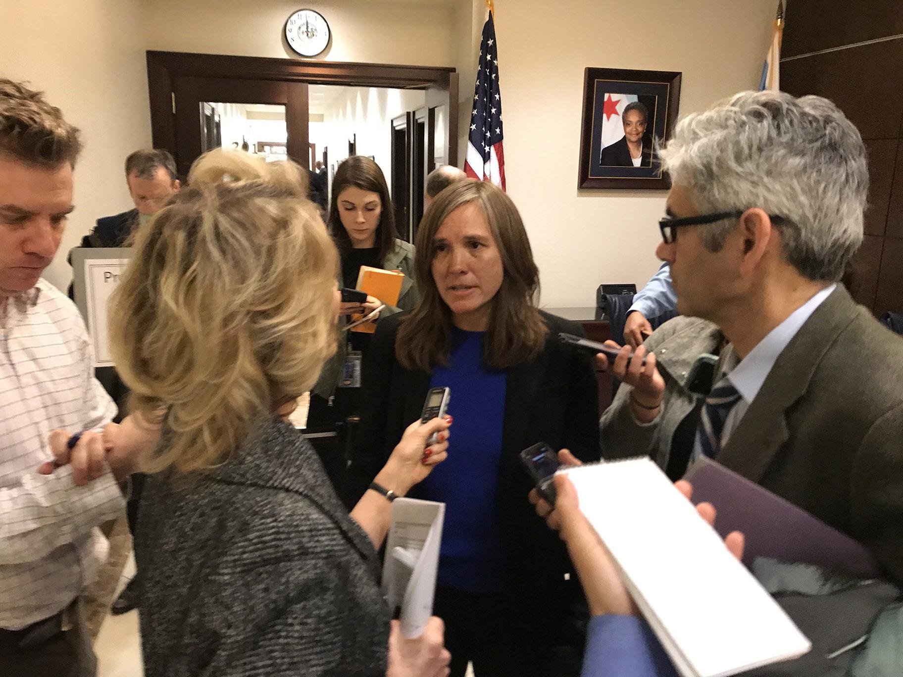 Presumptive Chicago Department of Transportation Commissioner Gia Biagi speaks with reporters at City Hall after the City Council’s Transportation Committee advanced her nomination on Tuesday, Jan. 7, 2020. (Nick Blumberg / WTTW News)