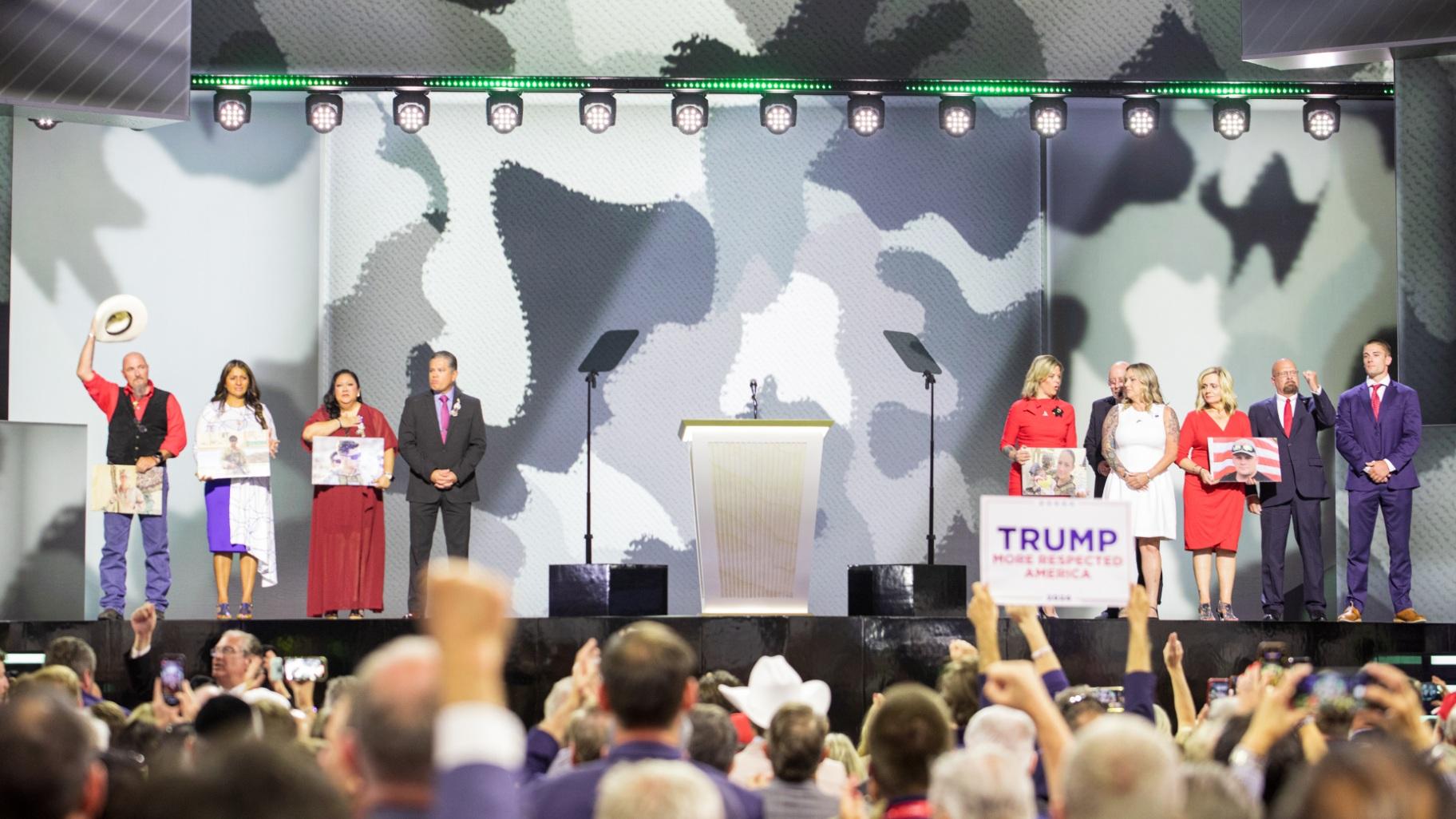 Families of the 13 U.S. servicemembers killed in a 2021 terrorist attack exiting Afghanistan join the stage at the Republican National Convention on July 17, 2024. (Michael Izquierdo / WTTW News)