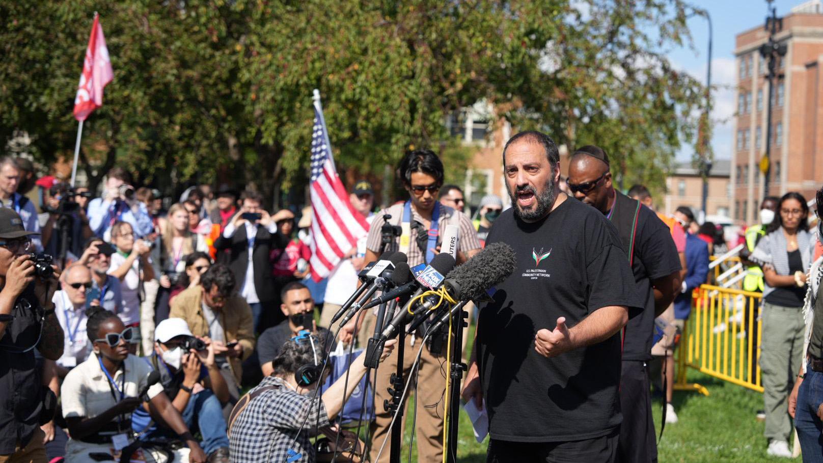 Organizer Hatem Abudayyeh speaks at a press conference before the Coalition to March on the DNC’s rally and march on Monday, Aug. 19, 2024. (Emily Soto / WTTW News)