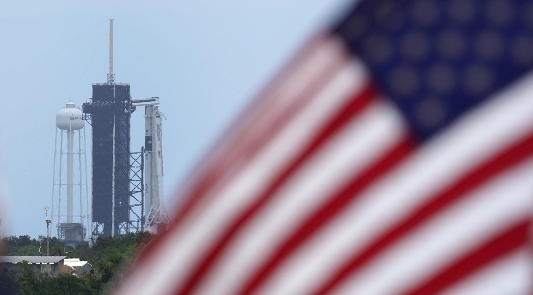 A SpaceX Falcon 9, with NASA astronauts Doug Hurley and Bob Behnken in the Crew Dragon capsule, sits on Launch Pad 39-A at the Kennedy Space Center in Cape Canaveral, Fla., Saturday, May 30, 2020. The two astronauts are on the SpaceX test flight to the International Space Station scheduled to liftoff Saturday. (AP Photo / David J. Phillip)