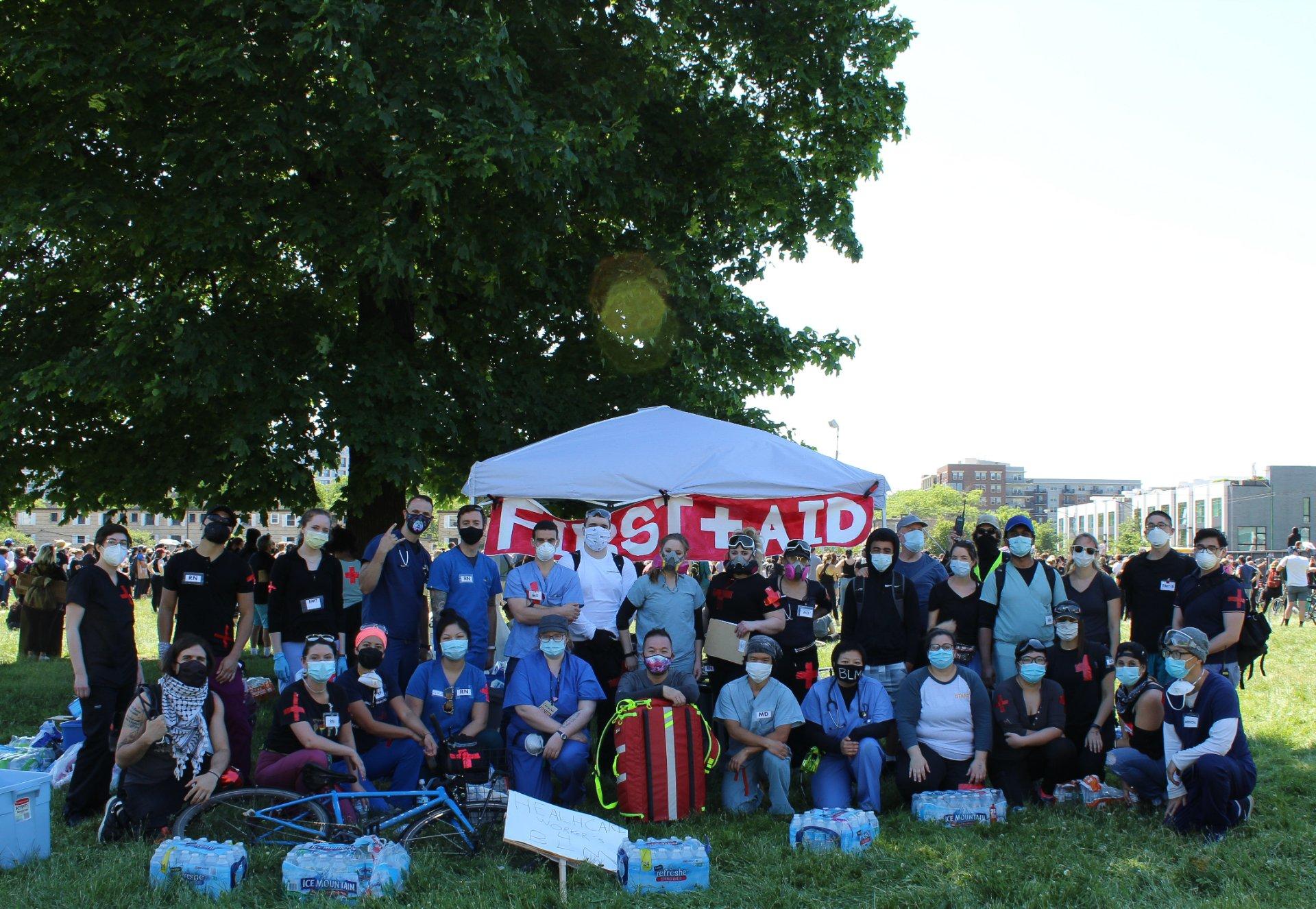 Health care workers volunteering as street medics set up a first aid tent during a rally held June 6, 2020 in Union Park. (Courtesy Dakota Lane)