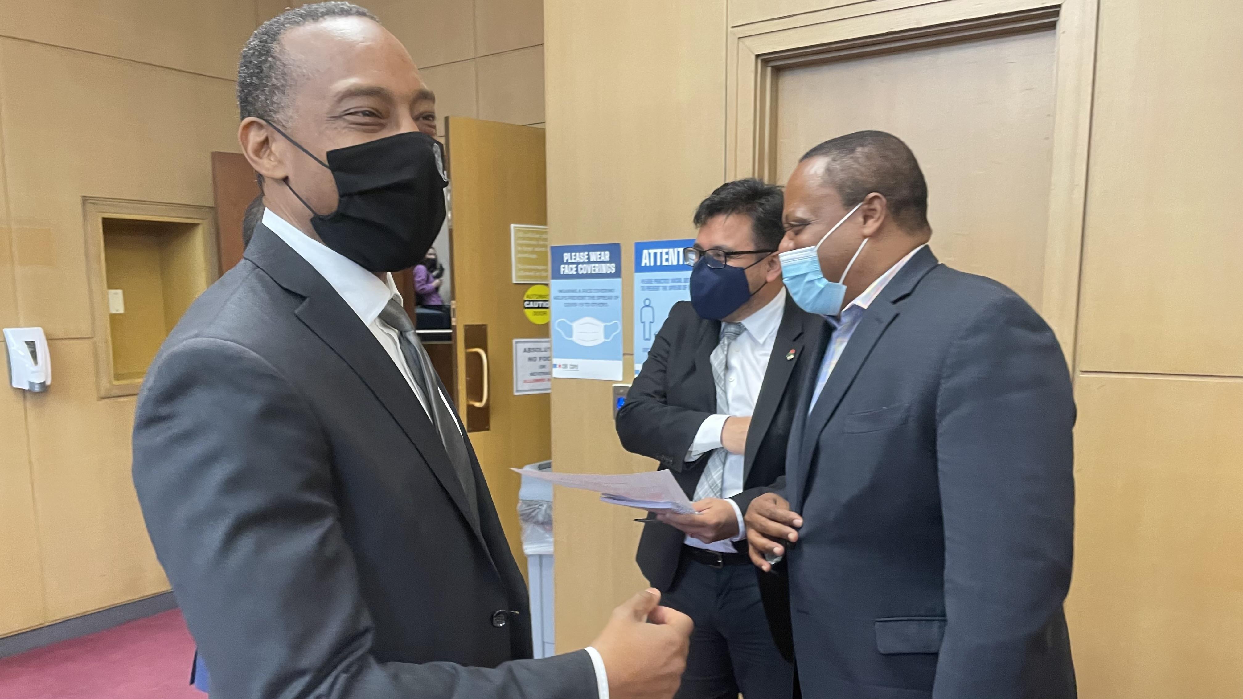 From left, Alds. Greg Mitchell (7th Ward), Byron Sigcho Lopez (25th Ward) and Michael Scott (24th Ward) discuss the latest proposal for Chicago's ward map. (Heather Cherone/WTTW News)