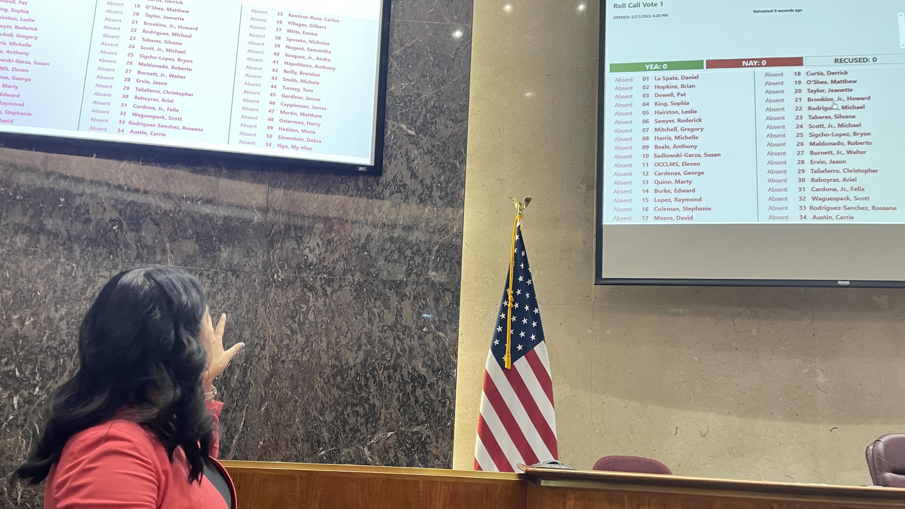 City Clerk Anna Valencia discusses the new digital screens that will display votes by members of the Chicago City Council on Monday, March 21. (WTTW News/Heather Cherone)