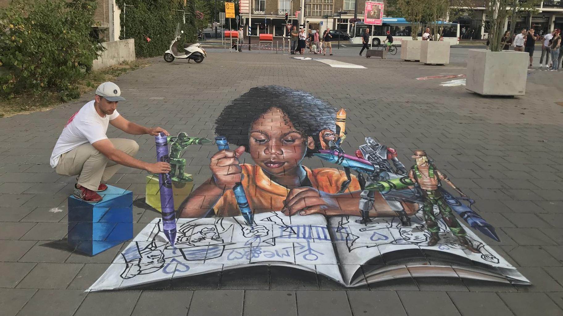 Watch How This Chalk Artist Creates Illusions on Pavement