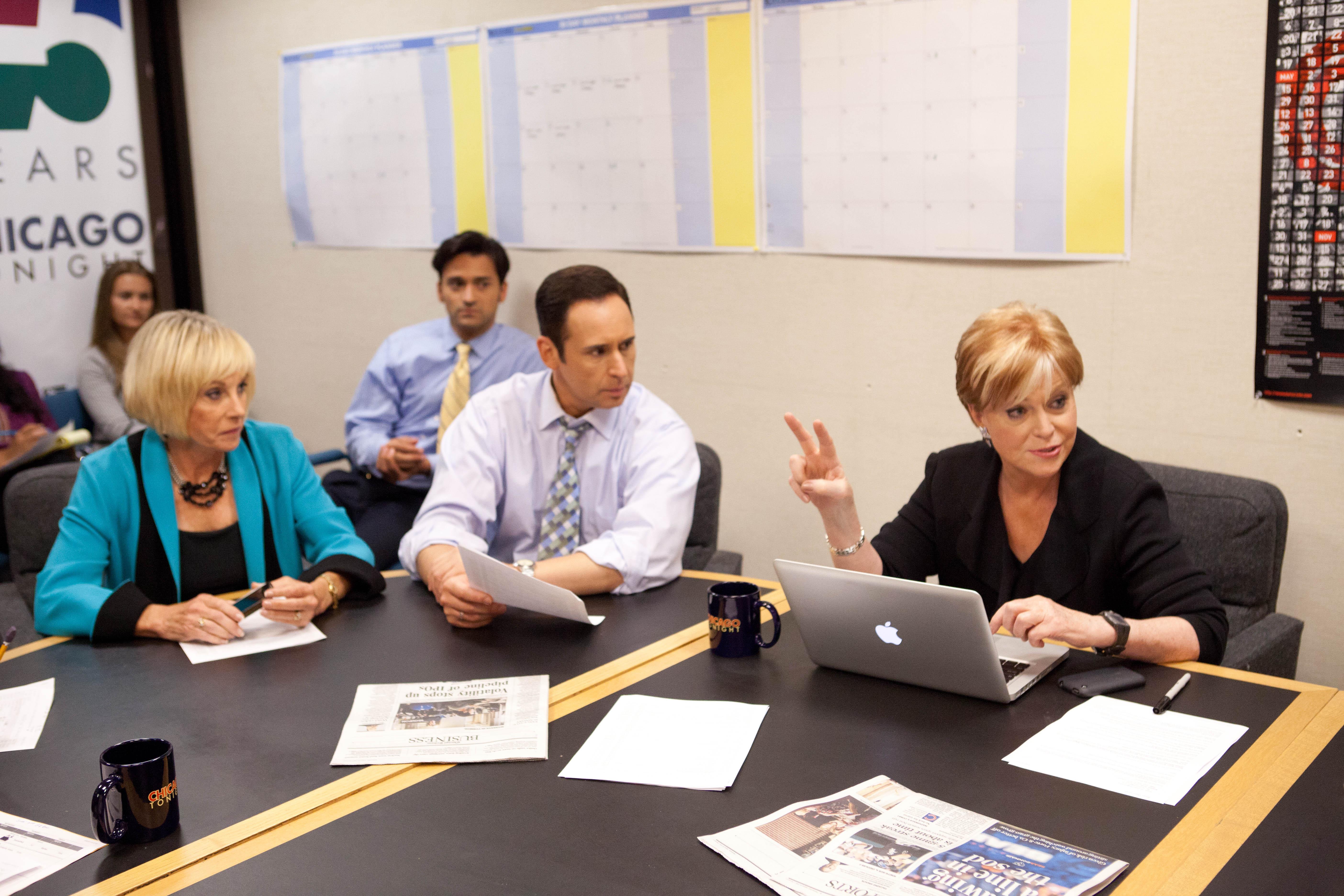 Elizabeth Brackett, Paris Schutz, Eddie Arruza and Carol Marin in a “Chicago Tonight” staff meeting.