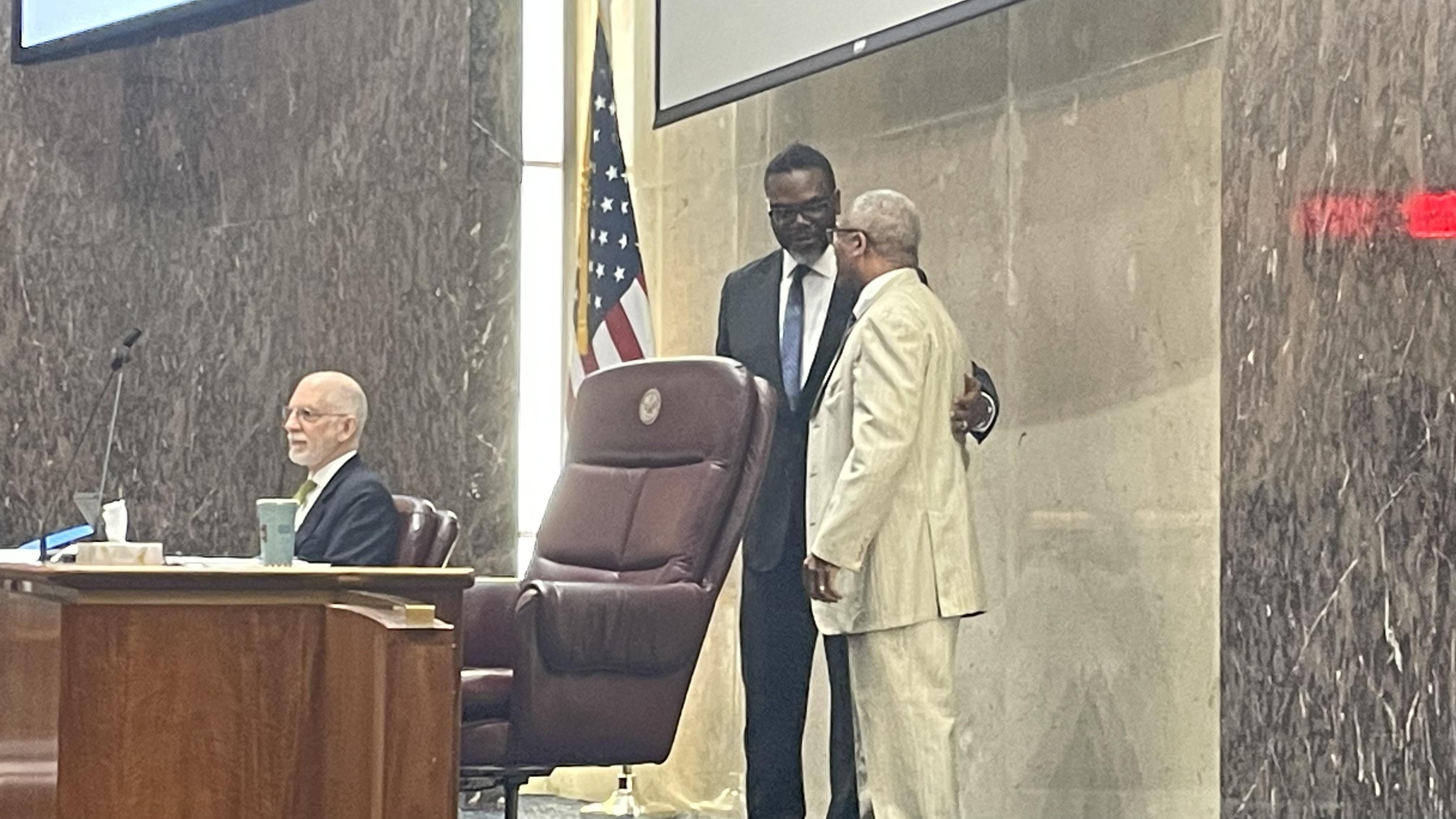 Mayor Brandon Johnson greets Ald. Walter Burnett (27th Ward), who will serve as vice mayor. (Heather Cherone/WTTW News)