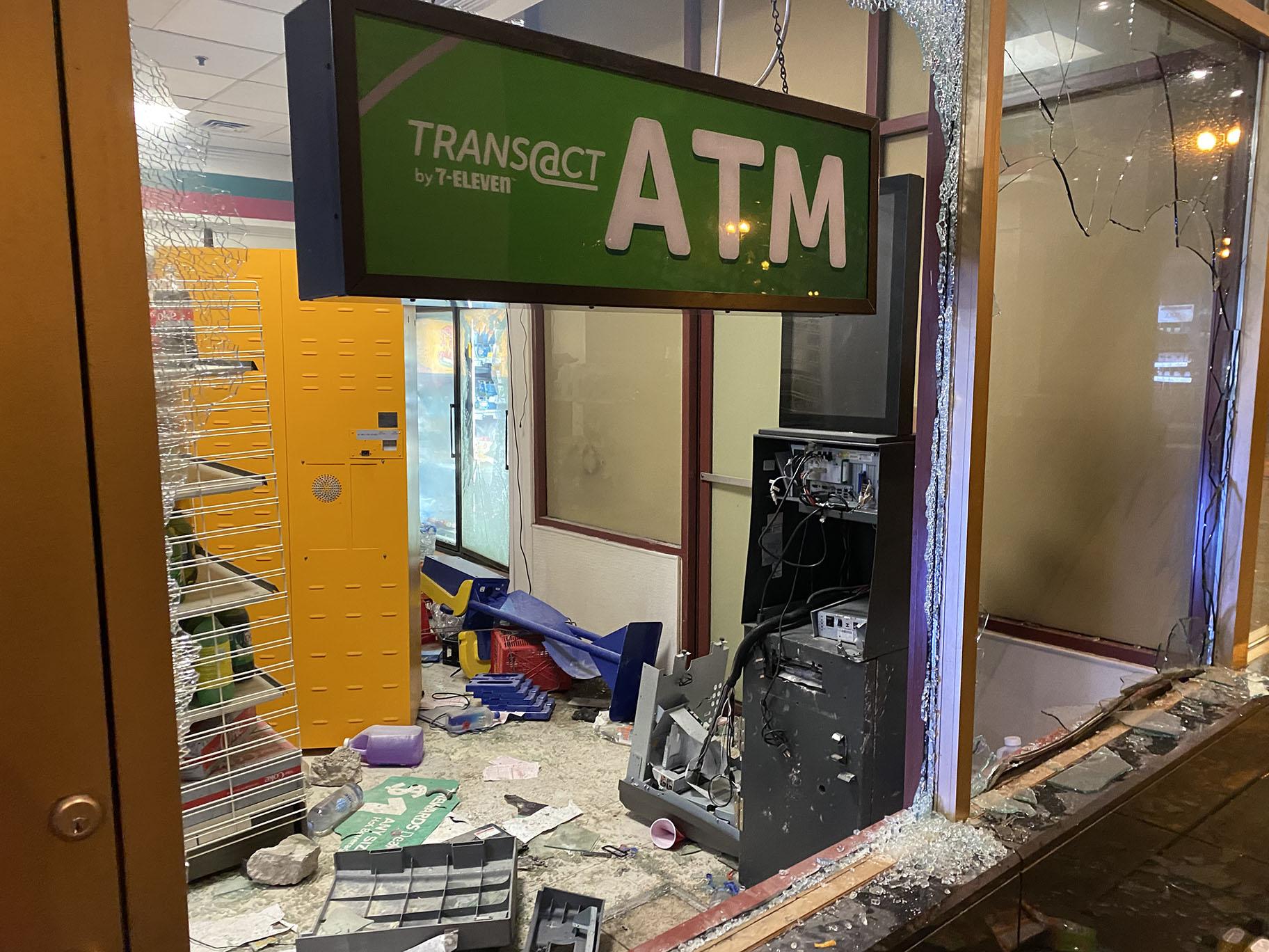 An ATM in the Loop is destroyed and windows are smashed on Saturday, May 30, 2020. (Hugo Balta / WTTW News)