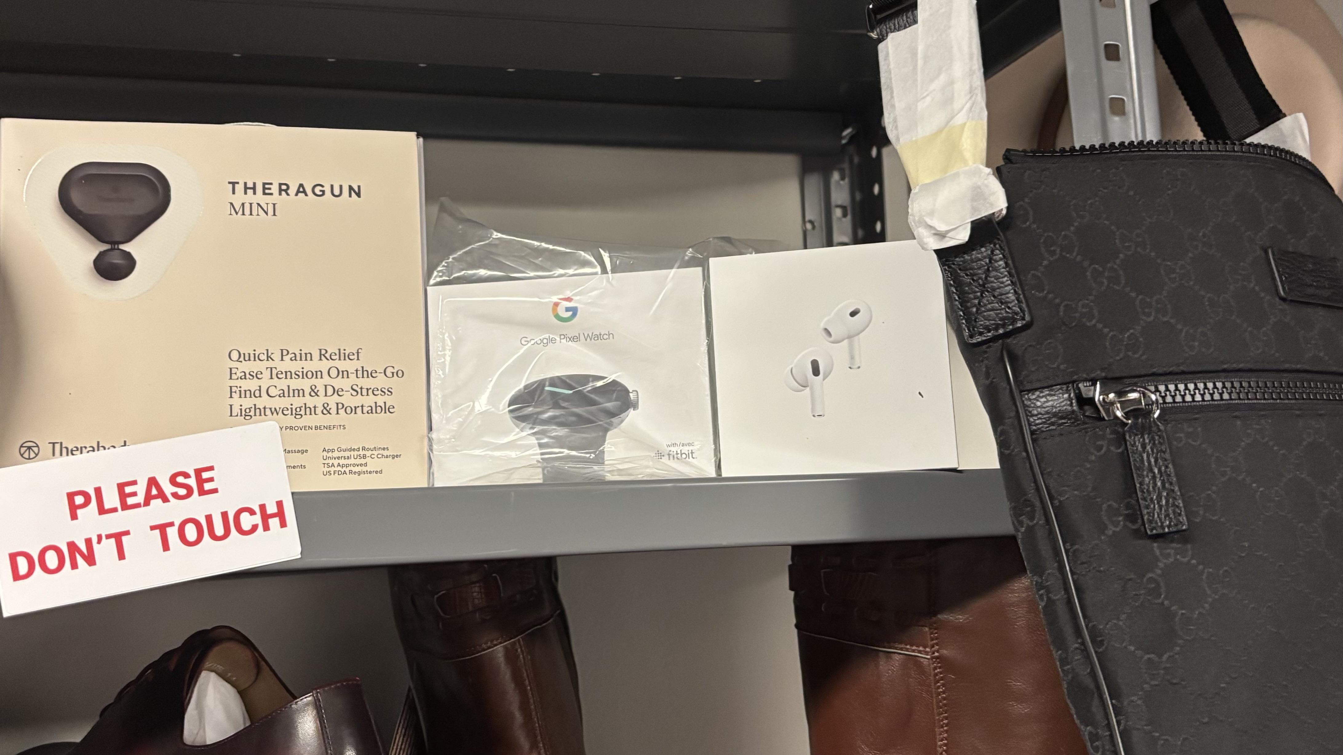 A Google Pixel watch given to Chicago Mayor Brandon Johnson by Kansas City Mayor Quentin Lucas and Apple Airpods accepted by the mayor by an unknown donor. (Heather Cherone/WTTW News)