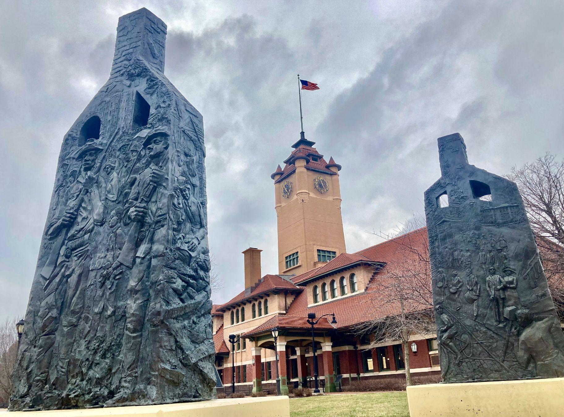 FILE - Sculptures representing charred chimneys rising from the smoldering rubble of burned-out buildings make up the Centennial memorial of the 1908 Race Riot entitled, "Acts of Intolerance" by Preston Jackson, on Wednesday March 22, 2023, in Springfield, Ill. (John O'Connor / AP Photo, File)