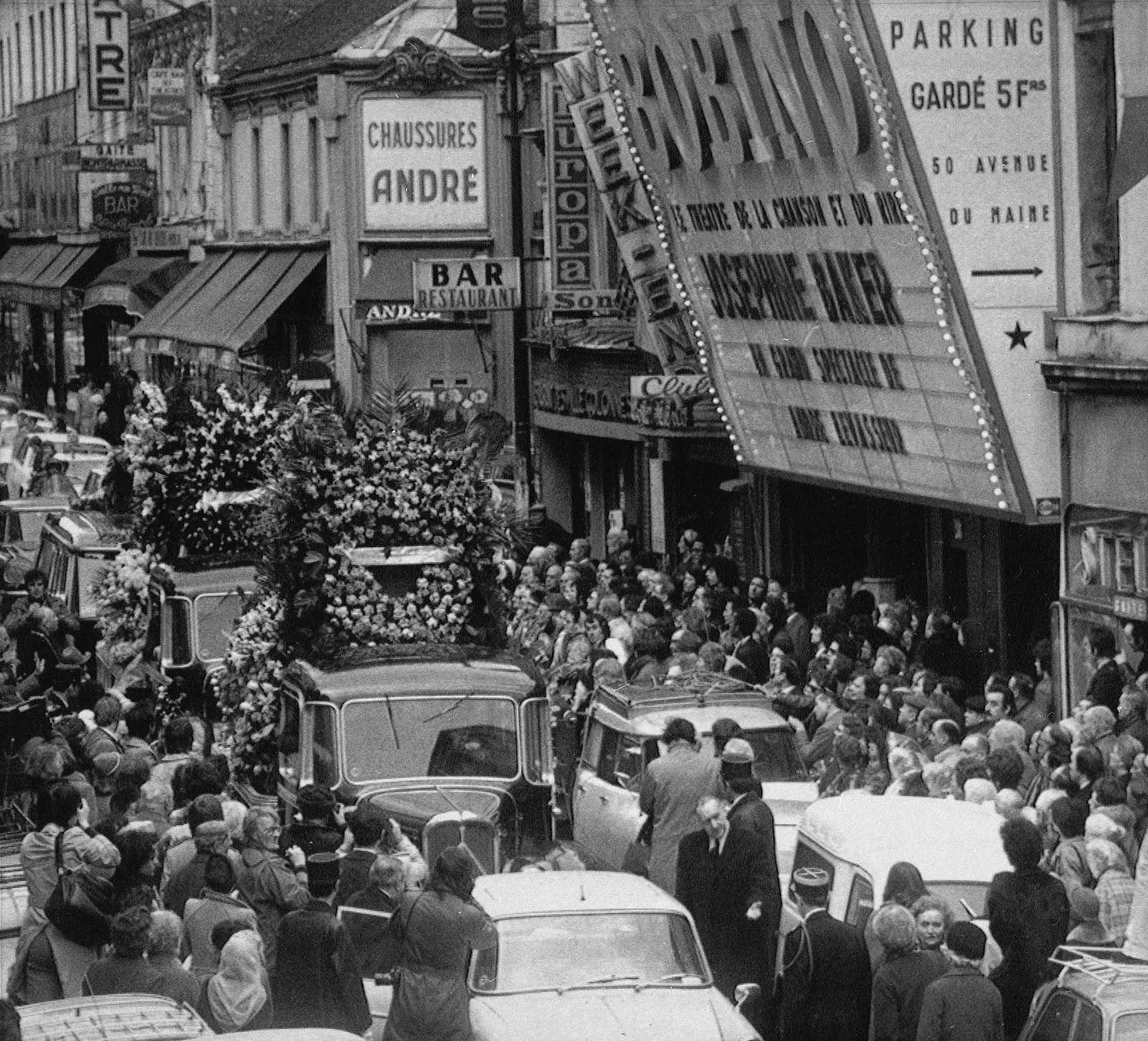 The funeral procession for entertainer Josephine Baker passes in front of the Bobino Theatre, April 15, 1975, where the American-born singer gave her last show shortly before she died at age 69. (AP Photo, File)