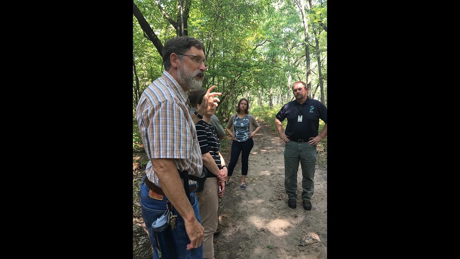 Scientists discuss climate change's impact on the Indiana Dunes. (Katherine Moore Powell / The Field Museum)