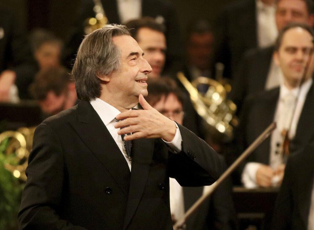 In this Jan. 1, 2018 file photo, Italian Maestro Riccardo Muti conducts the Vienna Philharmonic Orchestra during the traditional New Year’s concert at the golden hall of Vienna’s Musikverein, Austria. (AP Photo / Ronald Zak, File)