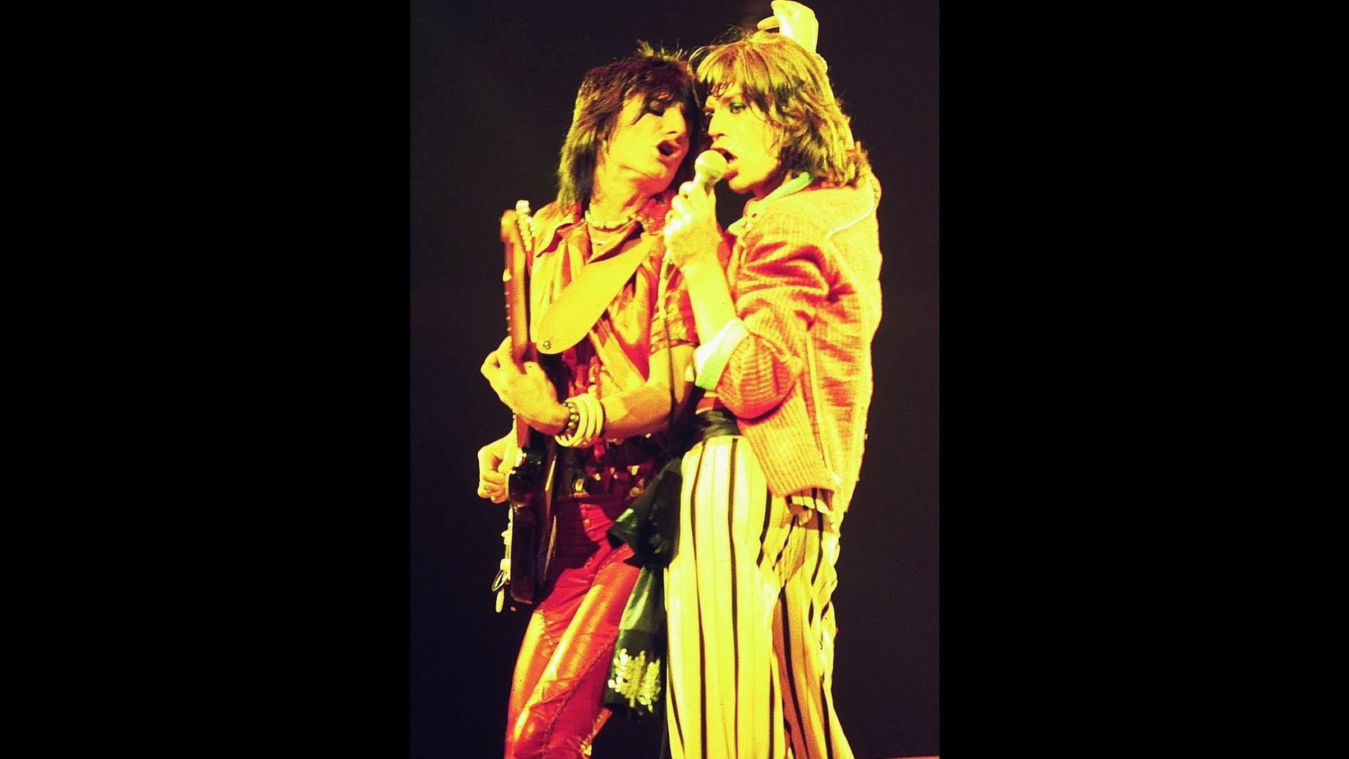 Mick Jagger, right, and Ronnie Wood of The Rolling Stones perform in Chicago in 1975. (Credit: Jim Summaria)