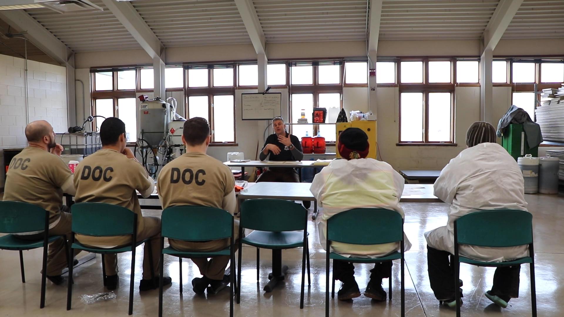 Corrections officer Tony Lordo speaks to Cook County Jail’s first biodiesel program class, which meets at the jail’s Mental Health Transition Center. (Evan Garcia / WTTW News)