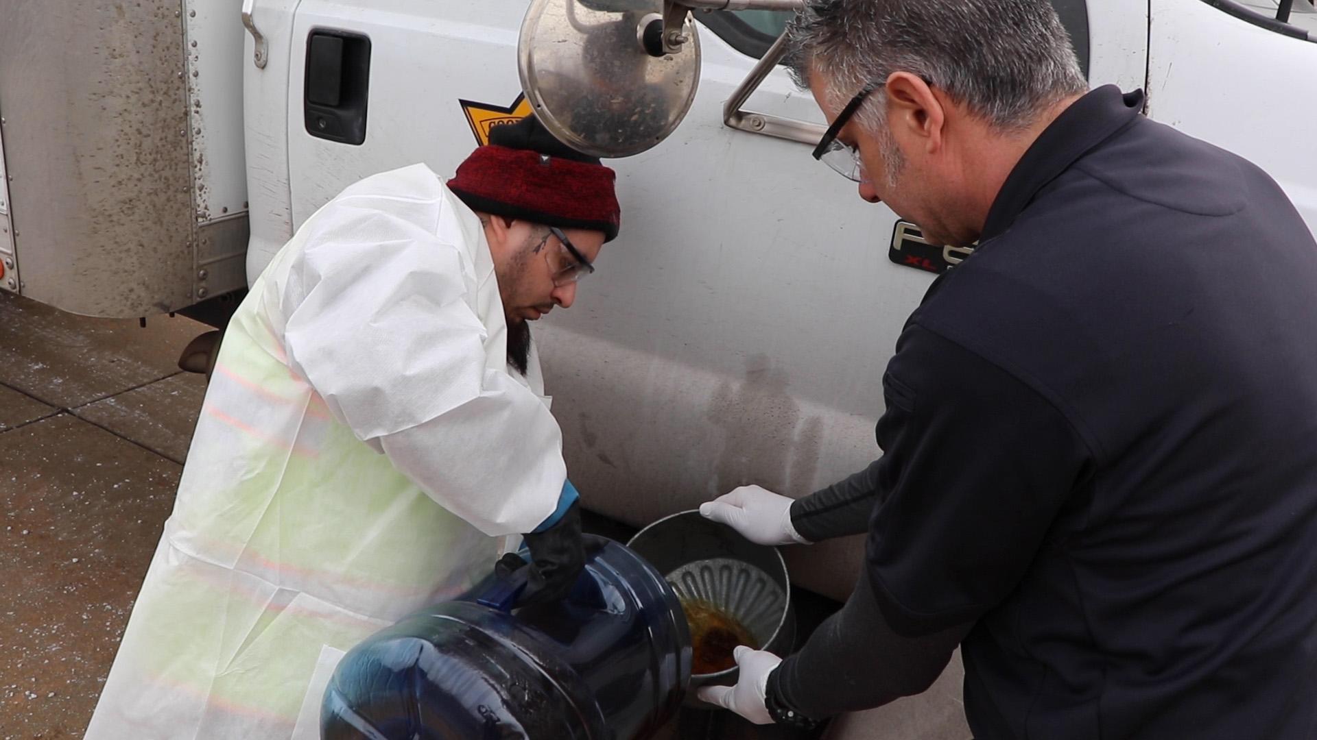 A Cook County Jail utility truck is filled with biodiesel fuel. Two trucks run exclusively on biodiesel fuel and the jail plans to switch two more trucks from petroleum diesel to biodiesel within the next few months. (Evan Garcia / WTTW News)