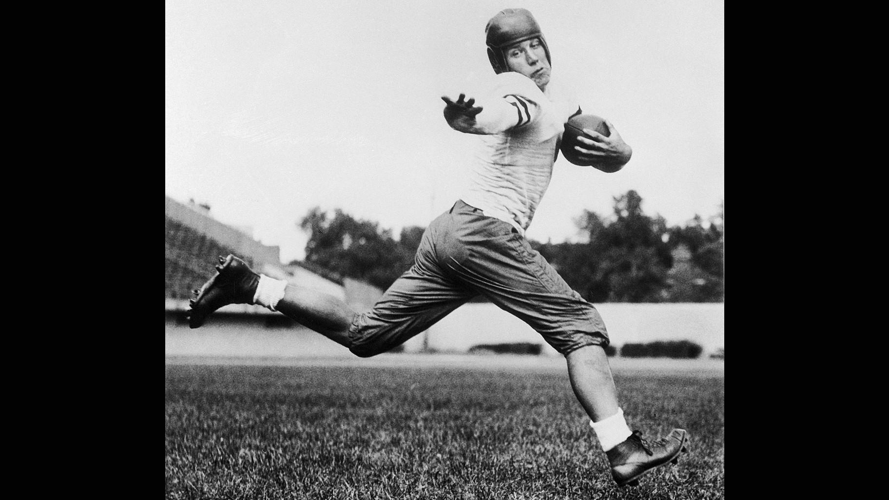 In this 1934 file photo, University of Chicago halfback Jay Berwanger is shown in the action pose that served as the model for the Heisman Trophy. (AP via CNNewsource)