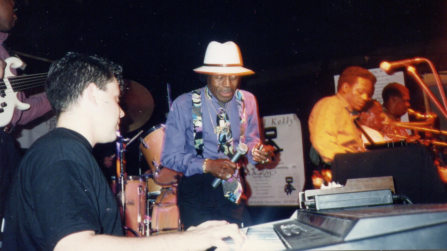 Johnny Iguana playing live with Junior Wells. (Courtesy of Johnny Iguana)