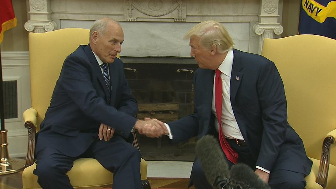 John Kelly and Donald Trump shake hands after Kelly is sworn in as White House chief of staff.