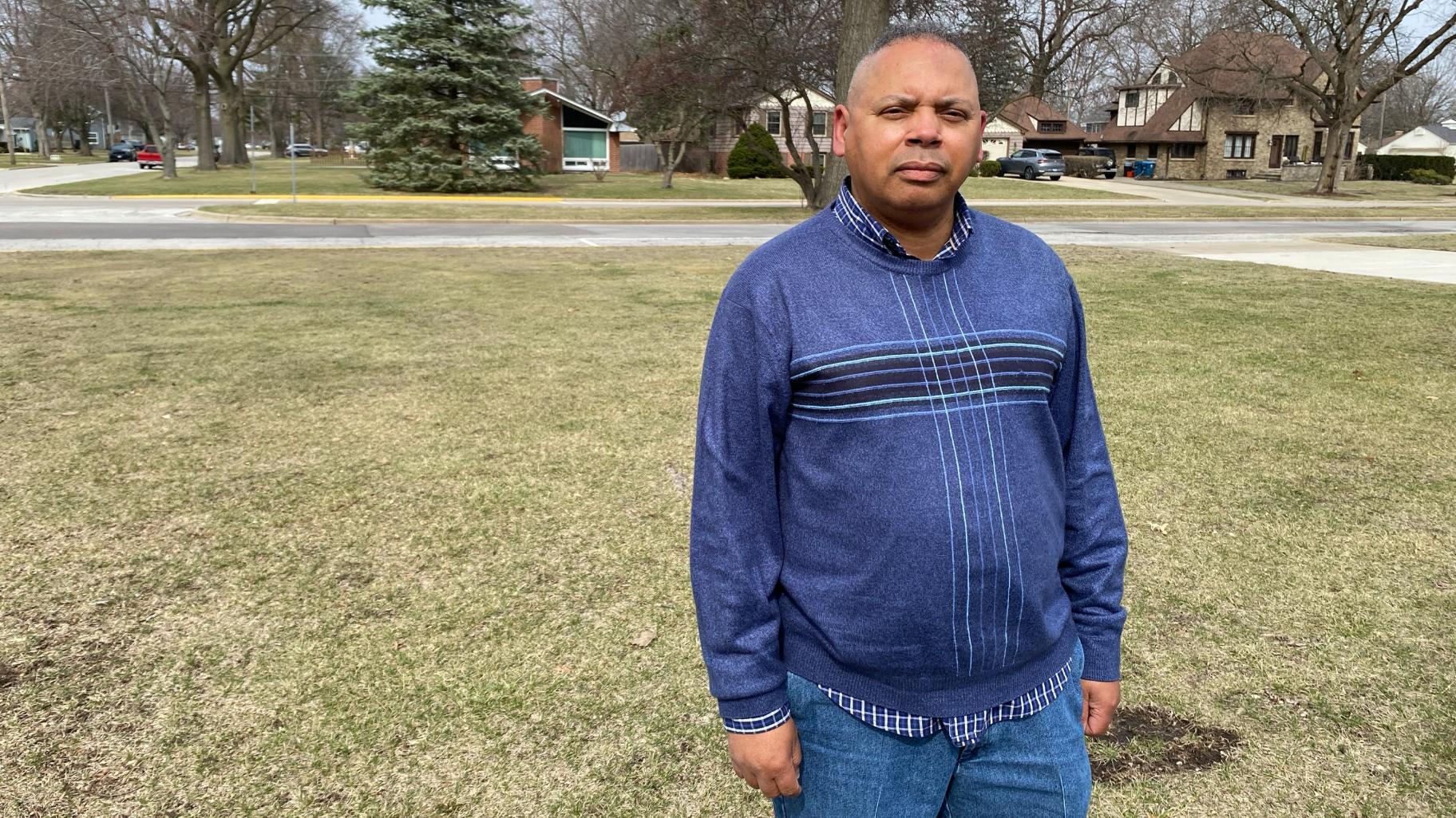 Ken Maurice stands outside his home in Aurora on March 18, 2025. (Nick Blumberg / WTTW News)