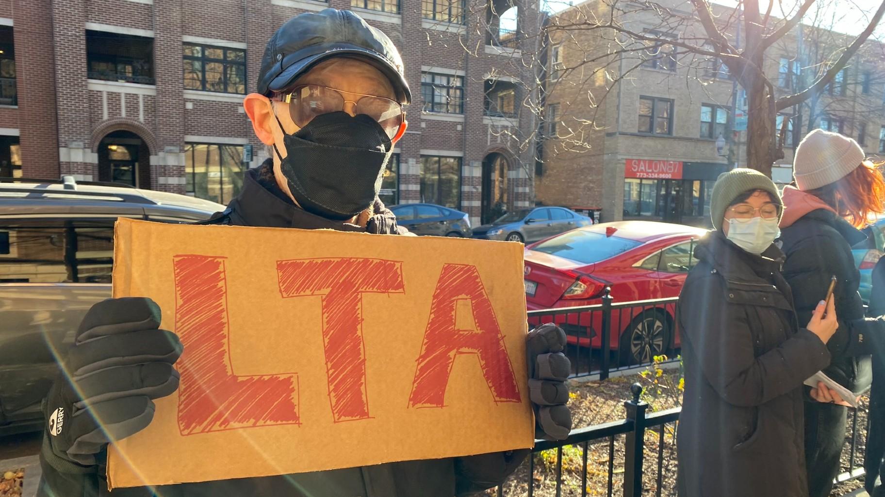 A member of the Lunt Tenants Association at the demonstration on Nov. 29, 2023. (Nick Blumberg / WTTW News)