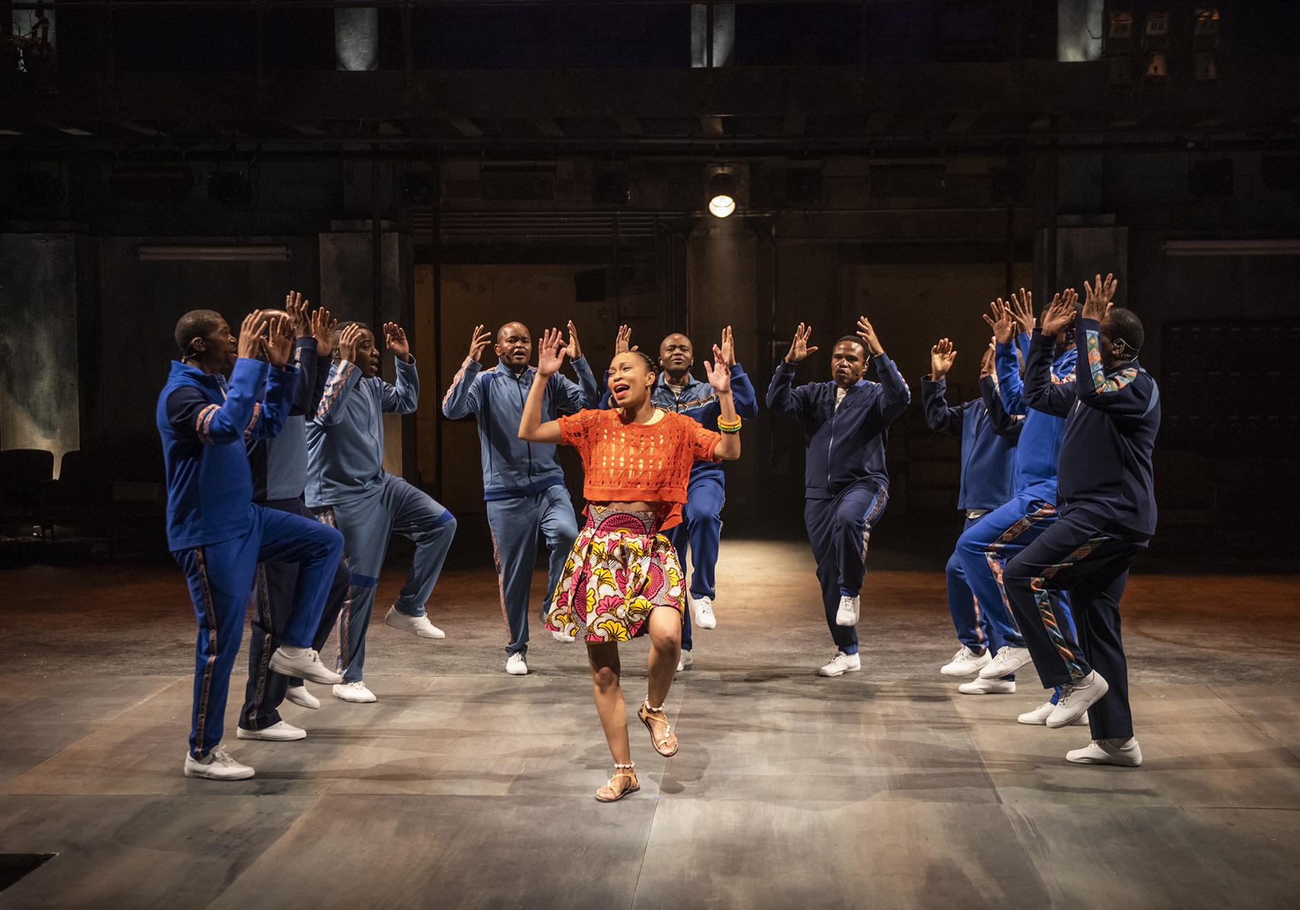 Nondumiso Tembe, center, with Ladysmith Black Mambazo in Steppenwolf’s world premiere of “Lindiwe” by ensemble member Eric Simonson. (Photo by Michael Brosilow)