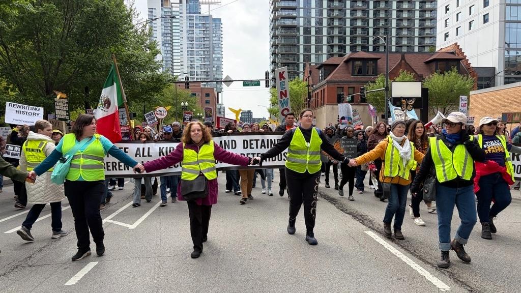 A May Day march makes its way into downtown Chicago on May 1, 2026. (Eunice Alpasan / WTTW News)