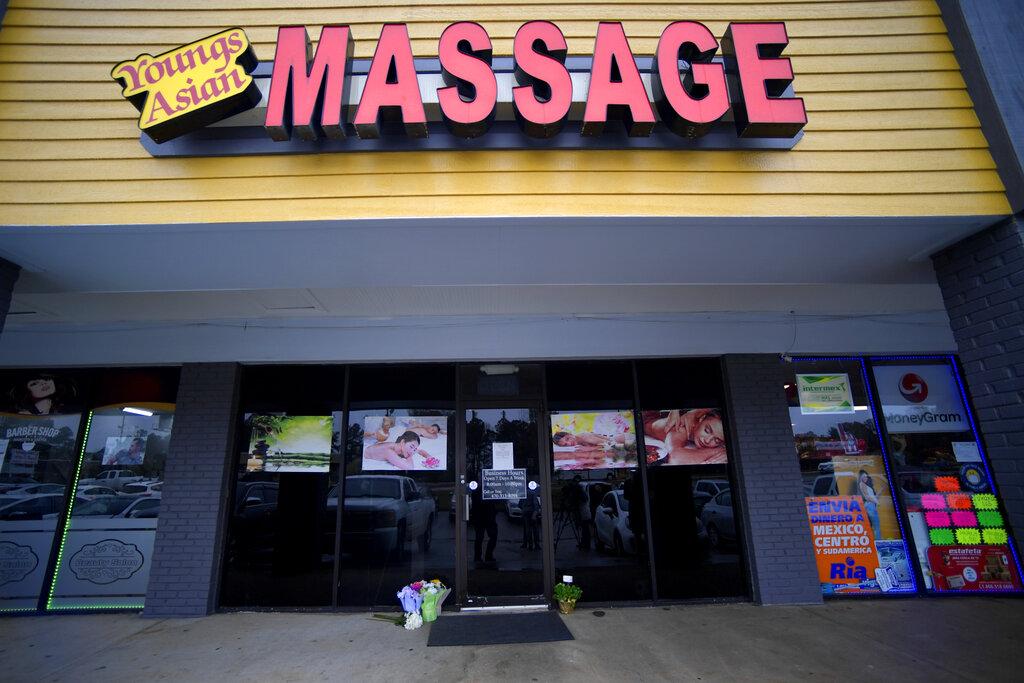 A makeshift memorial is seen Wednesday, March 17, 2021 outside a business where a multiple fatal shooting occurred on Tuesday, in Acworth, Ga. (AP Photo / Mike Stewart)