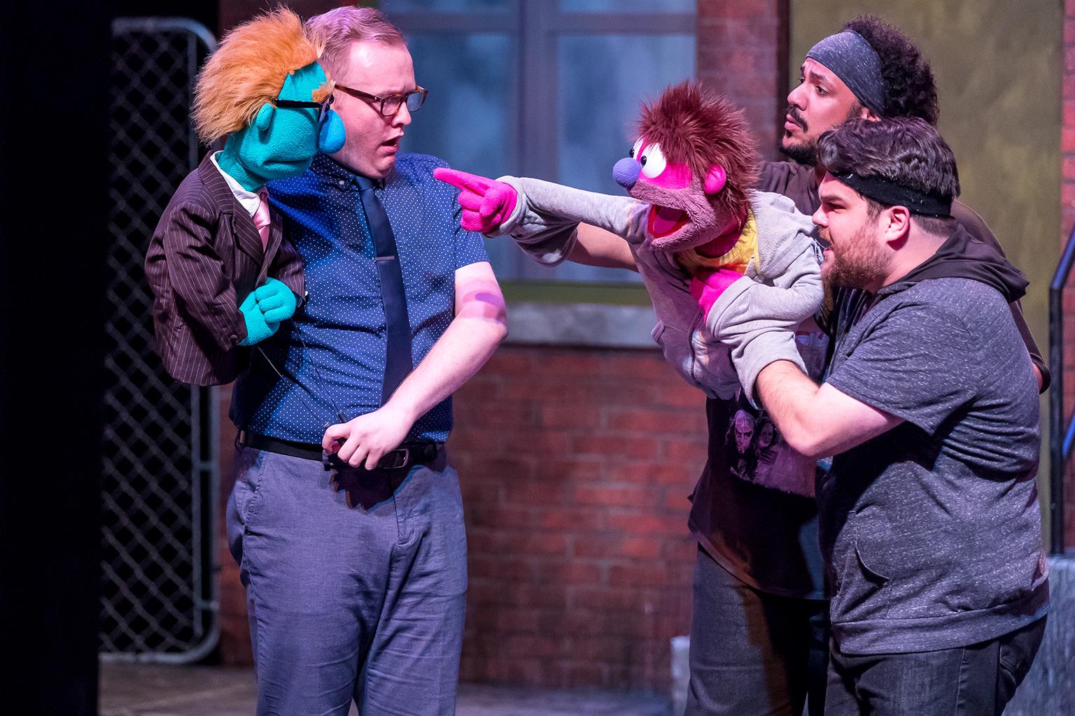 Christian Siebert, Jonah D. Winston and Dan Smeriglio in “Avenue Q” at Mercury Theater. (Credit: Brett A. Beiner)