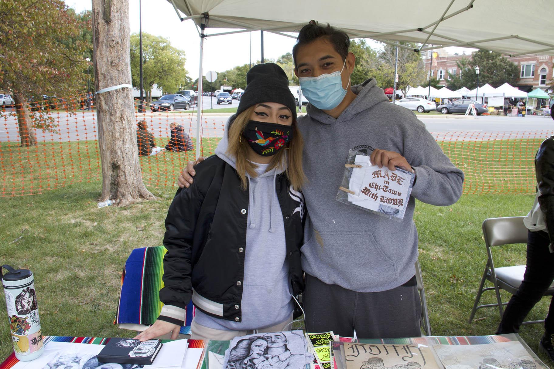 Artists Michelle Vega and Sir Charles at Zinemercado in Logan Square on Sunday, Oct. 4, 2020. (Ariel Parrella-Aureli / WTTW News)