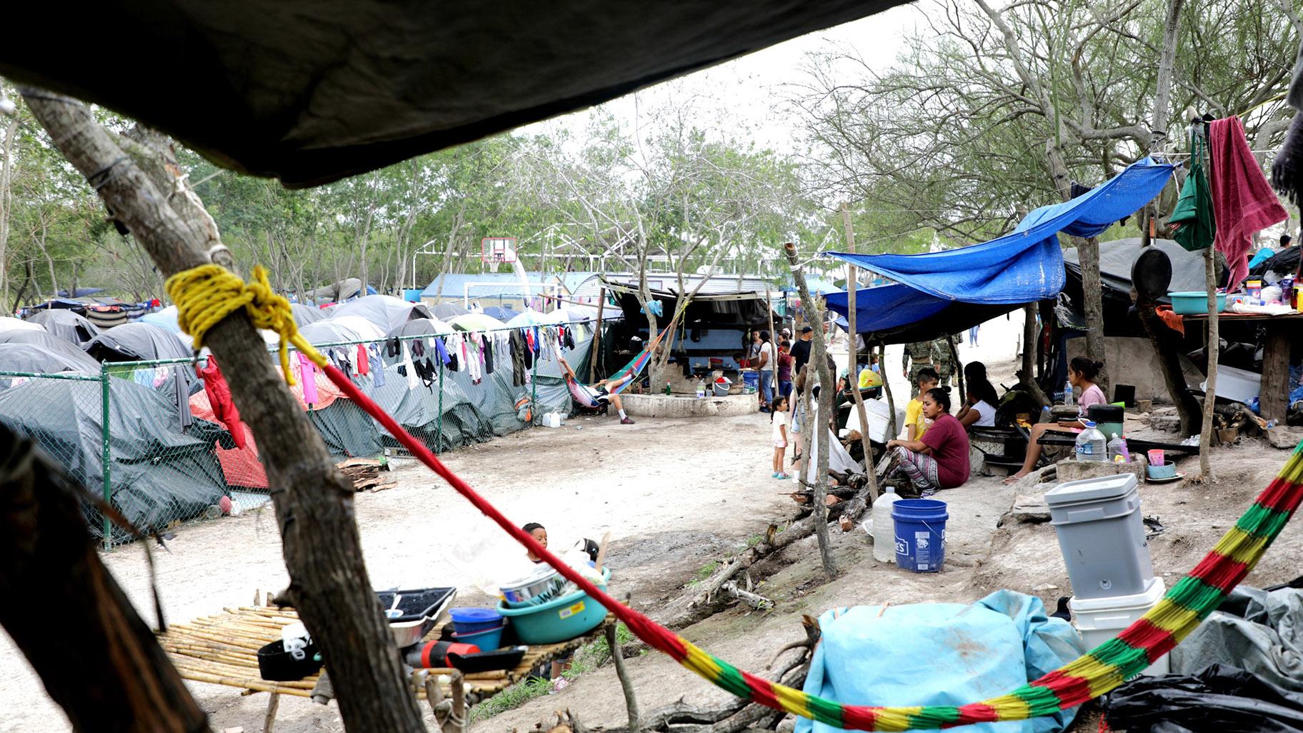 A migrant camp in Matamoros, Mexico, where thousands of asylum-seekers have been living for months as they wait for their court hearings. The camp is without running water or working toilets. (Credit: Maria Ines Zamudio)