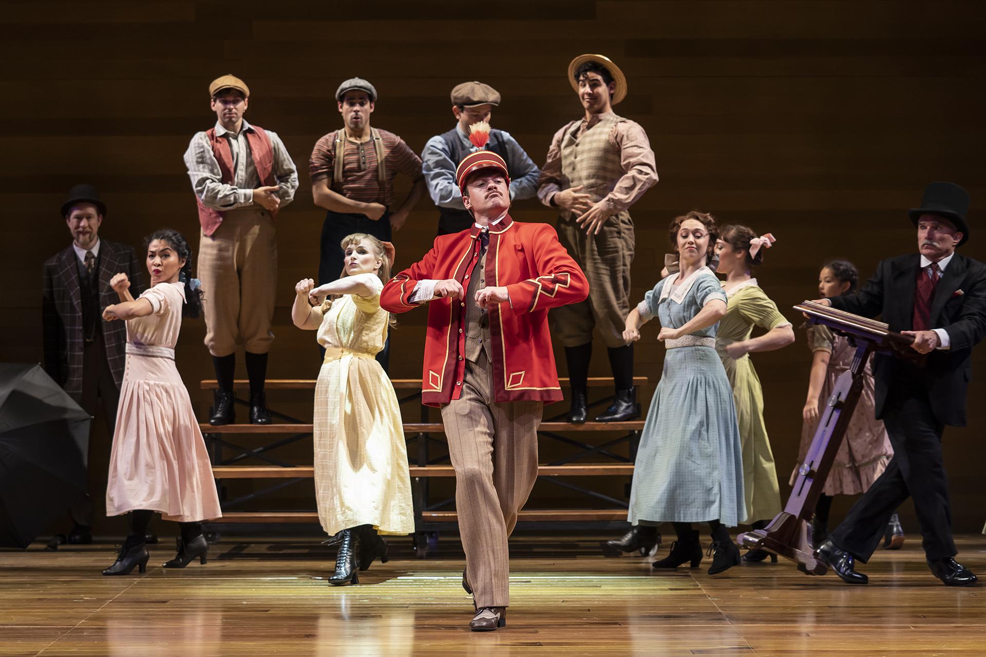 James Konicek, Ayana Strutz, Matt Casey, Tommy Rivera-Vega, Kelly Felthous, Christopher Kale Jones, Geoff Packard, Alejandro Fonseca, Laura Savage, Adrienne Velasco-Storrs, Sophie Ackerman and Ron E. Rains in “The Music Man” at the Goodman Theatre. (Photo by Liz Lauren)