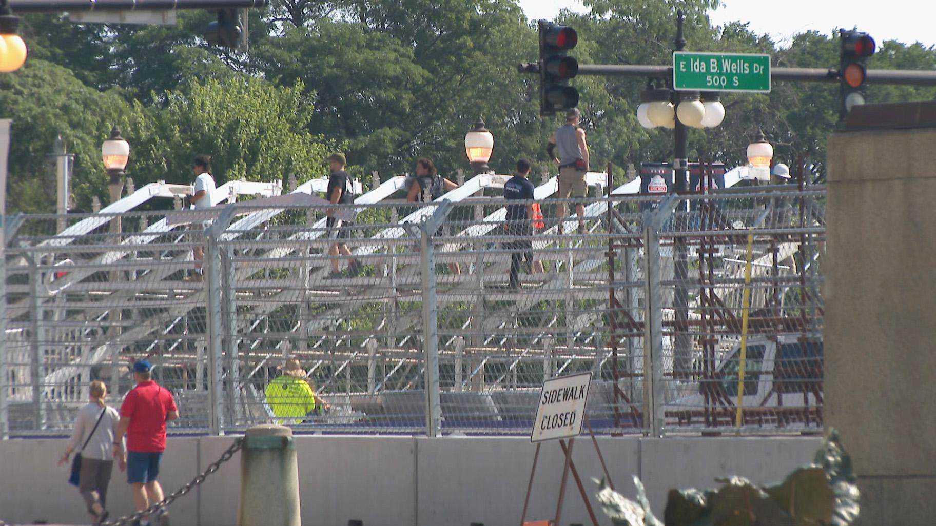 Workers start to tear down the NASCAR course and seating in downtown Chicago on July 3, 2023. (WTTW News)