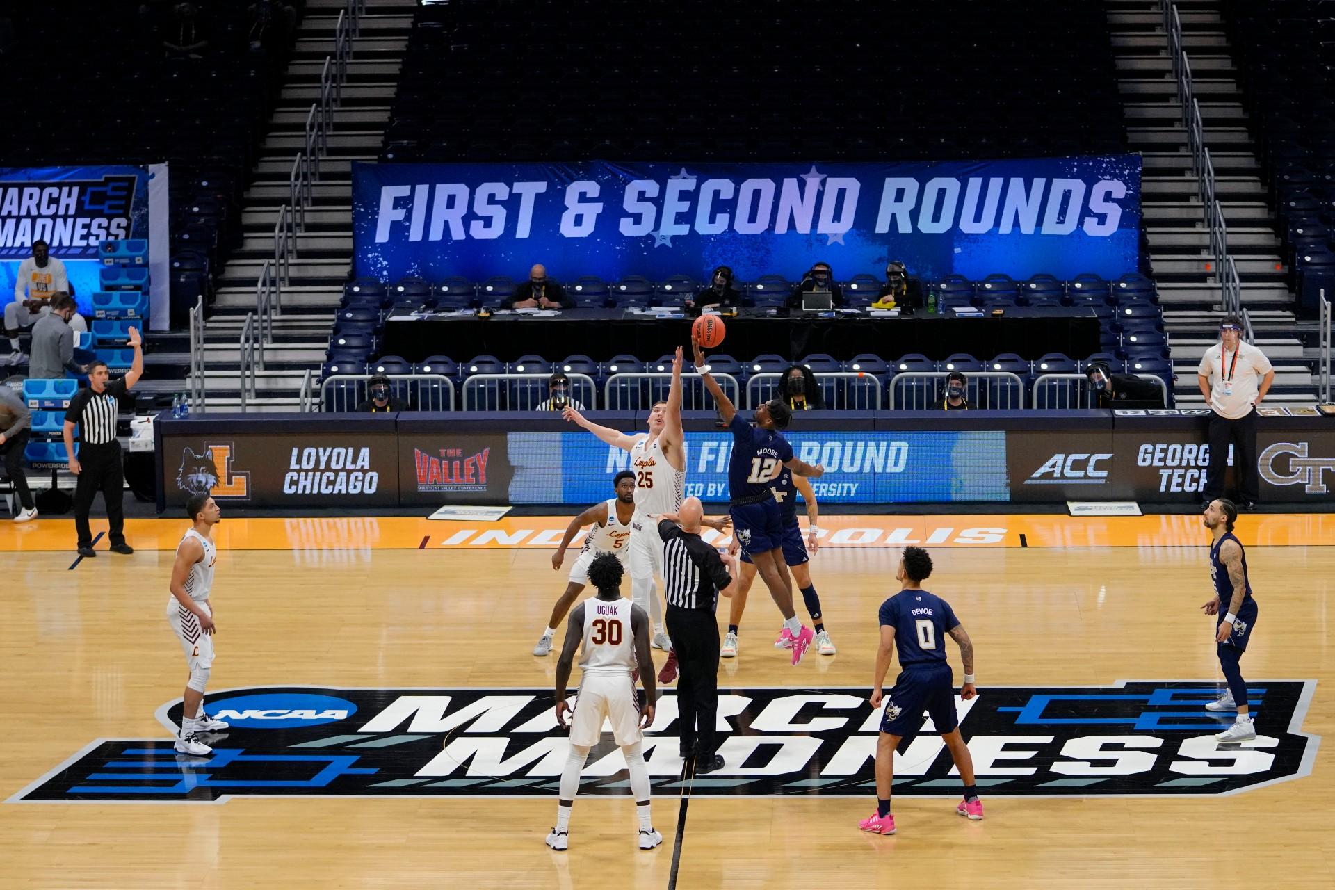 Georgia Tech tips off with Loyola Chicago at the start of a college basketball game in the first round of the NCAA tournament at Hinkle Fieldhouse, Indianapolis, Friday, March 19, 2021. (AP Photo / AJ Mast)