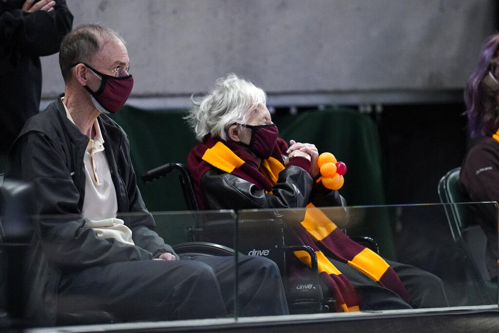 Sister Jean Dolores Schmidt watches Loyola Chicago play Illinois during the first half of a men’s college basketball game in the second round of the NCAA tournament at Bankers Life Fieldhouse in Indianapolis, Sunday, March 21, 2021. (AP Photo / Paul Sancya)