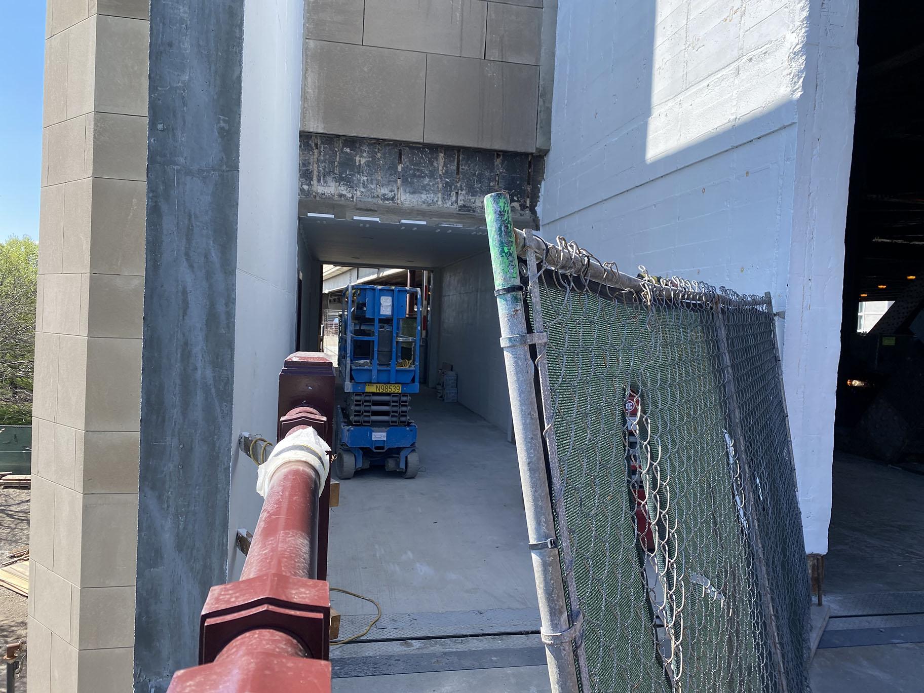 Construction equipment inside one of the fenced off bridge houses, where the northbound portion of the Lakefront Trail will eventually pass through on the Navy Pier Flyover. April 30, 2021. (Nick Blumberg / WTTW News)