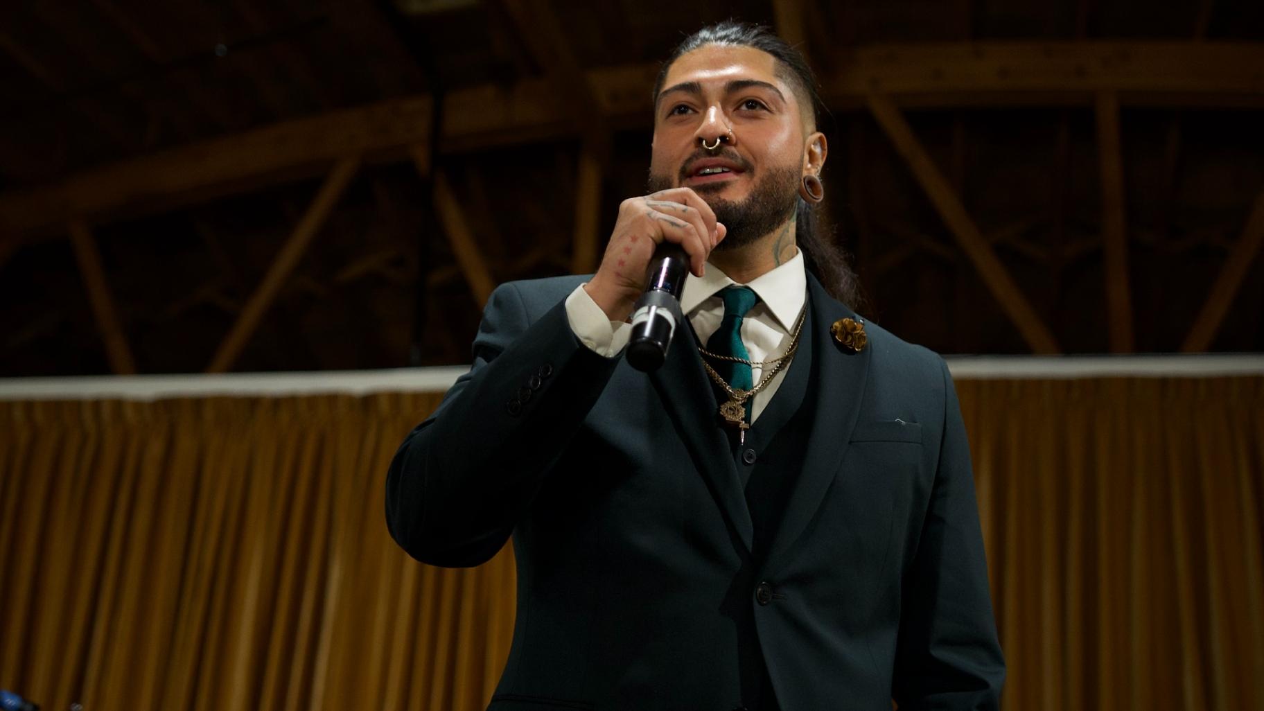 Chicago tattoo artist and Green Soap Collective founder Nelson Aviles speaks during the inaugural “The Living Canvas” tattoo exhibition on Nov. 1, 2025. (Courtesy of Khalil Jones)