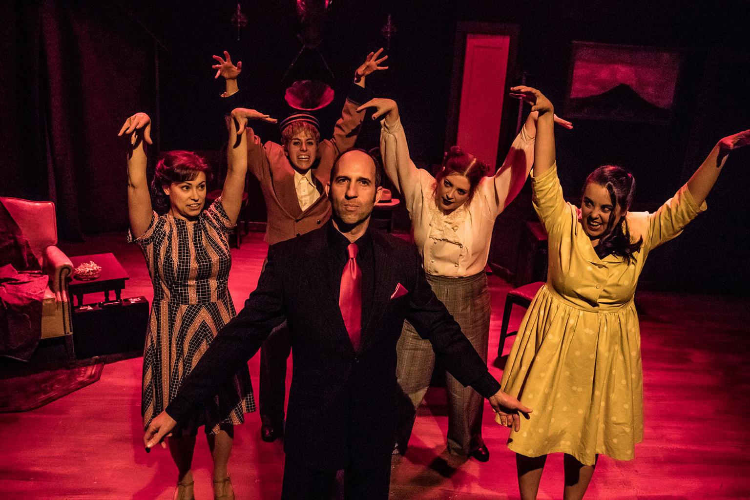 Lee Wichman, center, with, from left: Megan DeLay, Ellen DeSitter, Caitlin Jackson and Maiko Terazawa in “Nightmares and Nightcaps: The Stories of John Collier.” (Photo by Cole Simon)