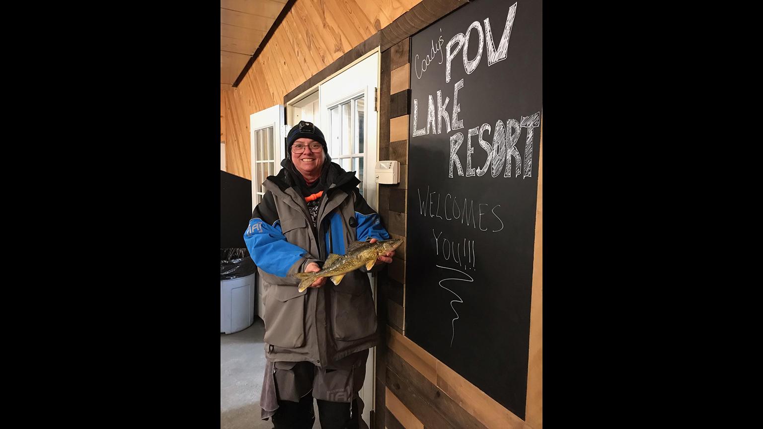 Jan Michalets poses for a photo with her catch at the Coadys’ Point of View Lake Resort in Wisconsin. (Courtesy Genevieve Coady)