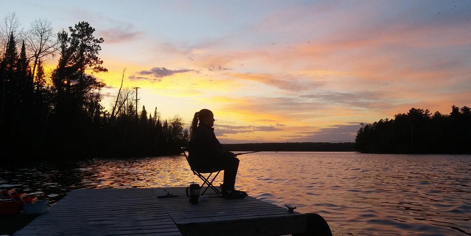 The sun sets over the lake at Coadys’ Point of View resort in Wisconsin. (Courtesy Genevieve Coady)