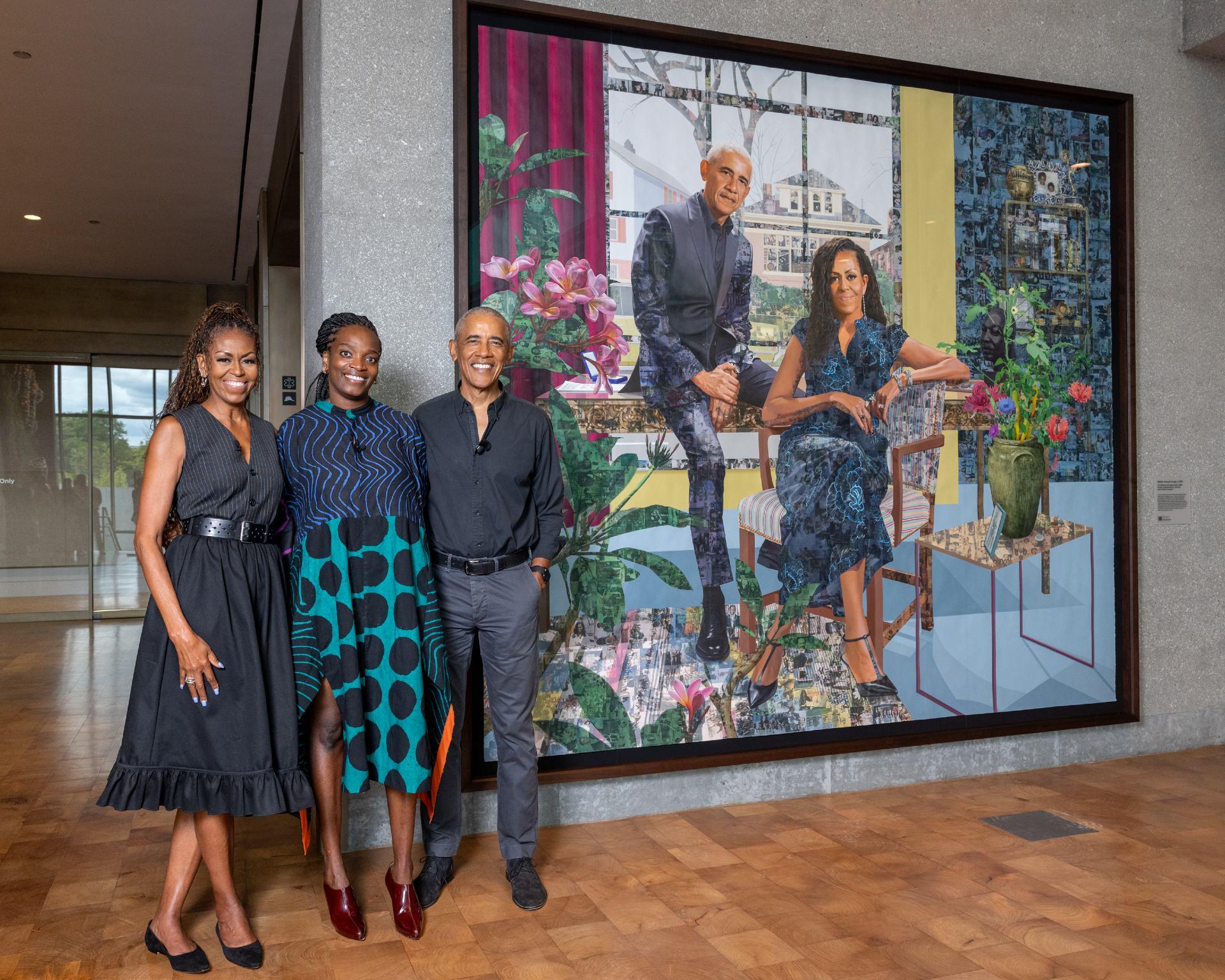Former President Barack Obama and former first lady Michelle Obama pose for a photo with artist Njideka Akunyili Crosby in the Obama Presidential Center Museum's Hope and Change Lobby on June 14, 2026. (Courtesy of The Obama Foundation)