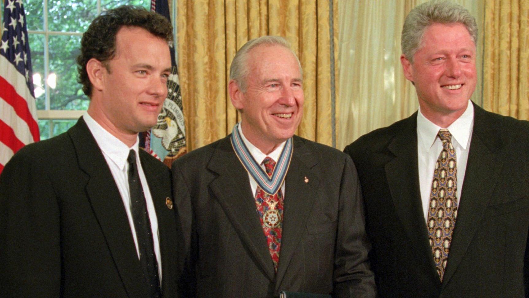 President Clinton stands with actor Tom Hanks, left, and former astronaut James Lovell in the Oval Office of the White House Wednesday, July 26, 1995, after presenting Lovell with the Congressional Space Medal of Honor. Hanks portrayed Lovell in the movie "Apollo 13." (AP Photo / Wilfredo Lee, File)